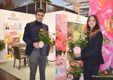 Adrian Soulie and Cenne Olivia of Meilland with Sugar Candy Rose, a new compact variety of rose with orange flowers fading to pink flowers and has good disease tolerance.